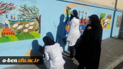 دست های کوچک اعضای کانون پرورش فکری کودک و نوجوان در زیباسازی دیوار بیرونی پردیس